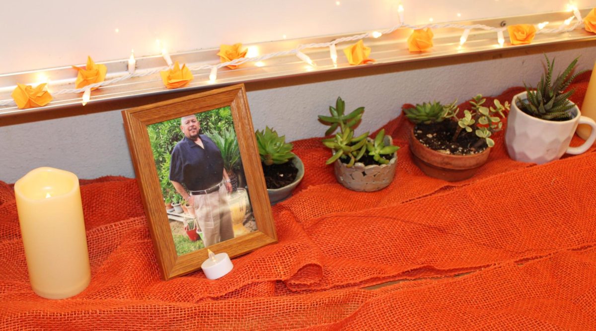 Espain includes an ofrenda for his father in his classroom. 