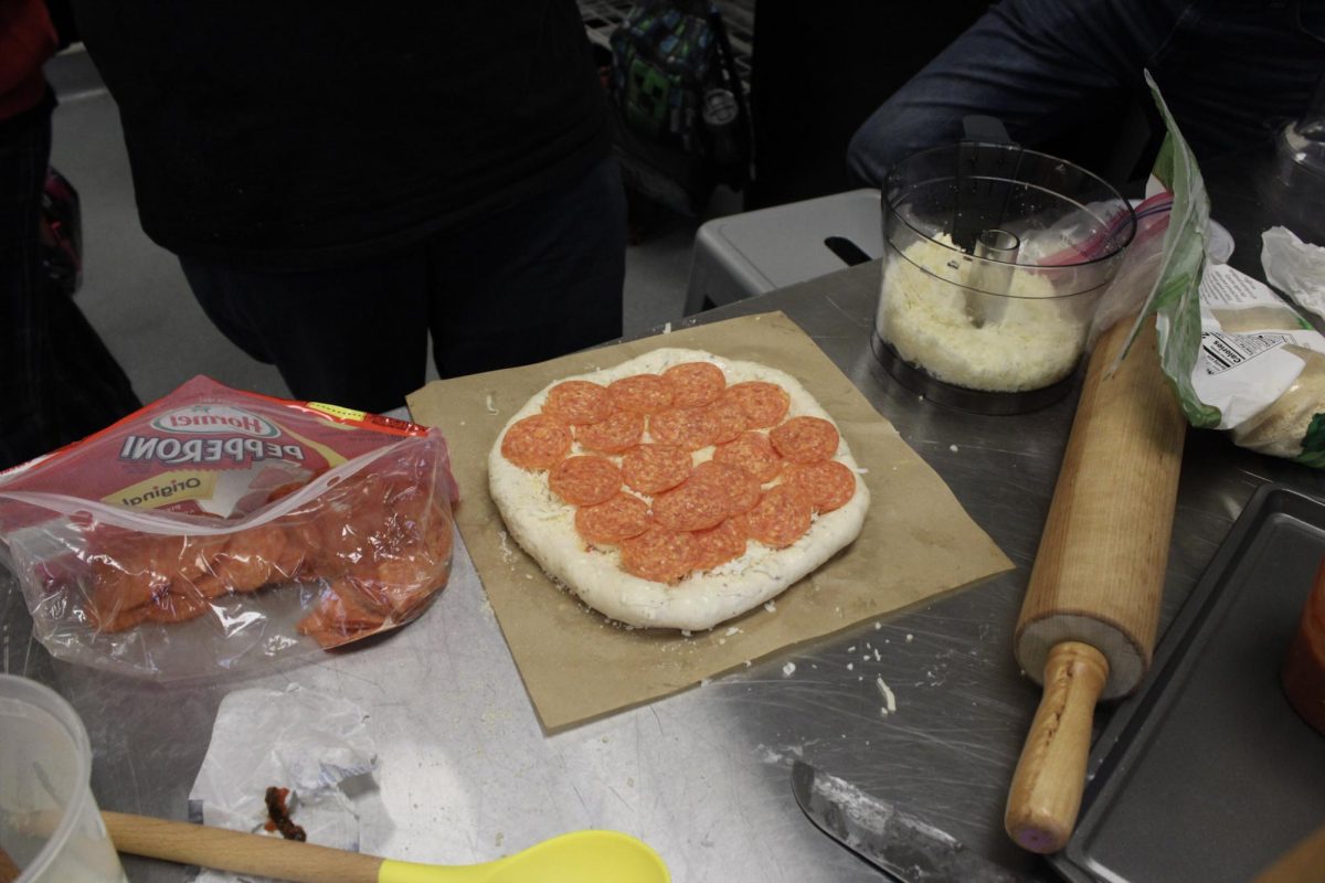 BHS culinary students prepare their pizza for the Pizza Palooza competition on Dec. 14.