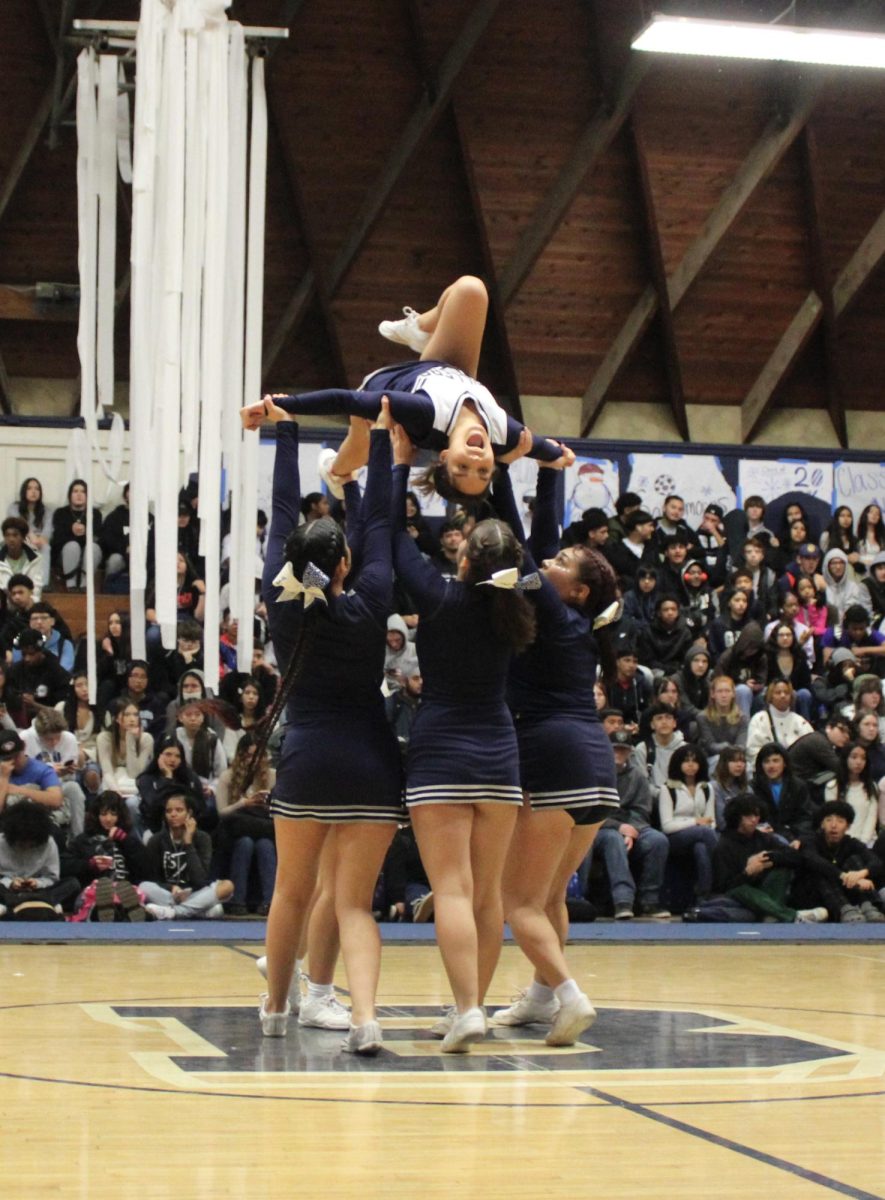 The BHS Cheer squad starts the rally with a spirited performance.
