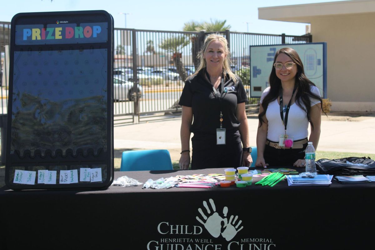 Child Henrietta Memorial Guidance Clinic hosts games at BHS Mental Health Fair.