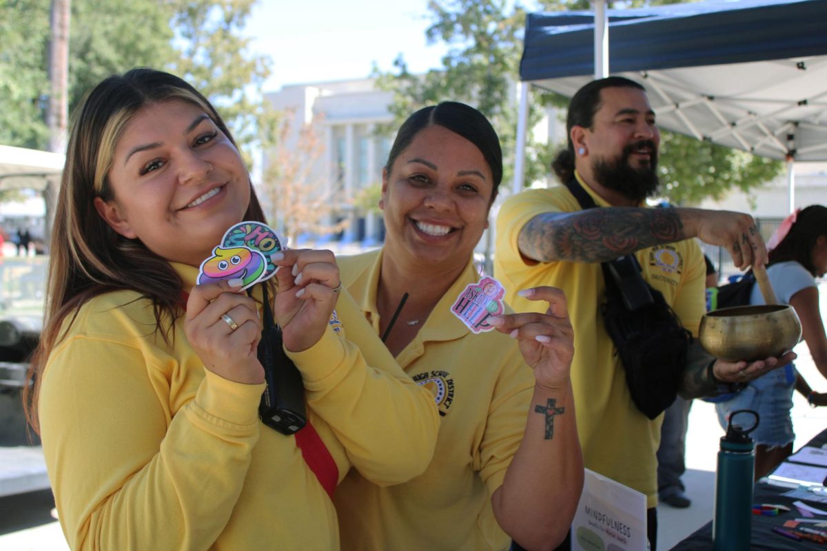 Driller staff show off the stickers 