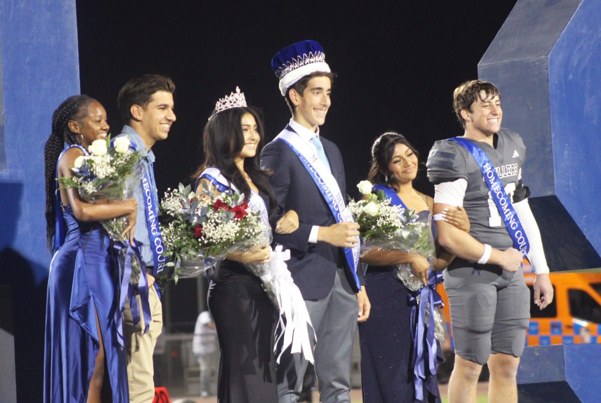 Thomas Woods and Arline Pineda are crowned the winner of Mr. and Miss BHS. 